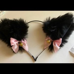 Black cat ears with pink bow and bells